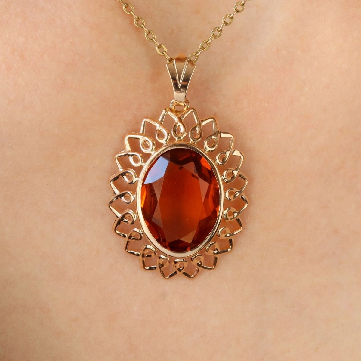 Pendentif vintage en or rose et verre orange - Castafiore