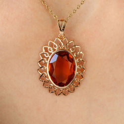 Pendentif vintage en or rose et verre orange - Castafiore