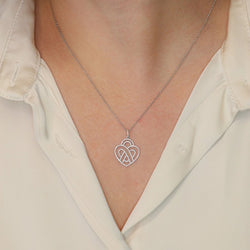 POIRAY Collier coeur entrelacé or blanc diamants - Castafiore