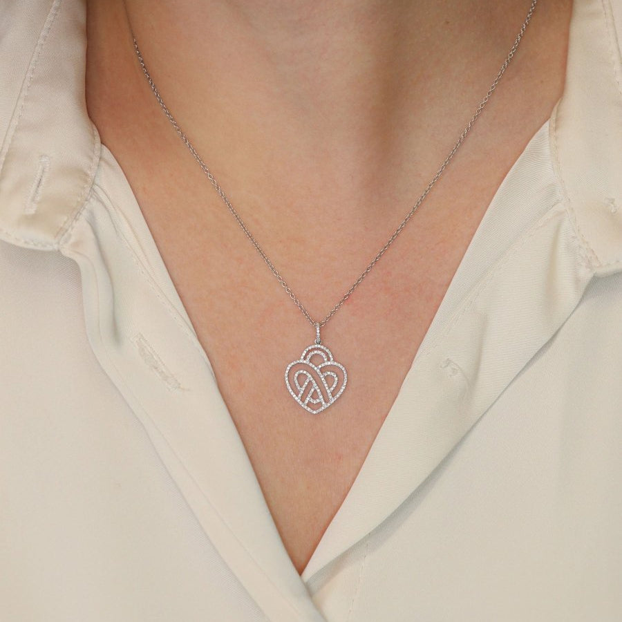 POIRAY Collier coeur entrelacé or blanc diamants - Castafiore