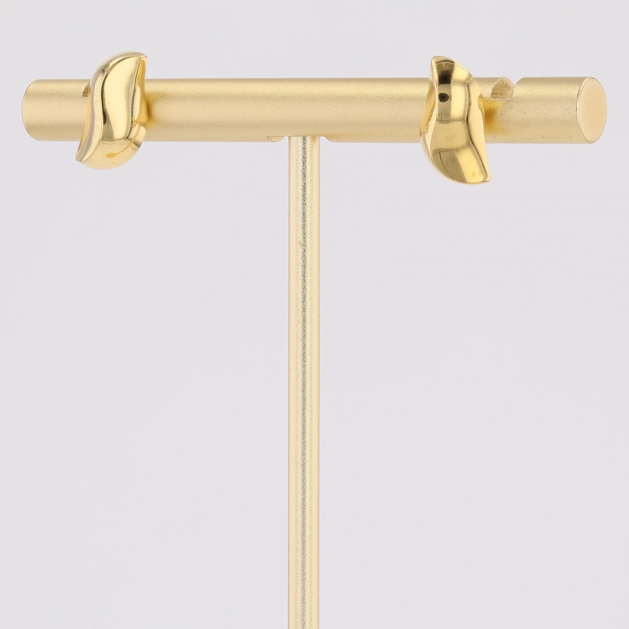 Puces d'oreilles or jaune virgule bombée