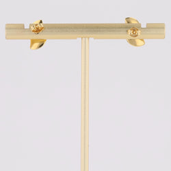 Puces d'oreilles or jaune virgule bombée