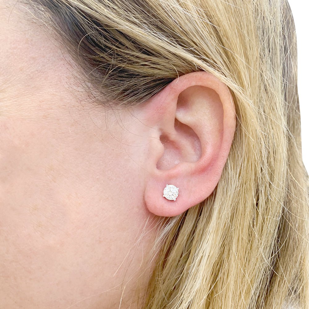 Puces d'oreilles en or blanc et diamants. - Castafiore