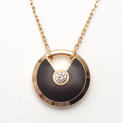 Sautoir Cartier Amulette PM en or rose et bois d'amourette - Castafiore