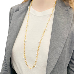 Sautoir Pomellato, "Capri", or rose, céramique blanche. - Castafiore