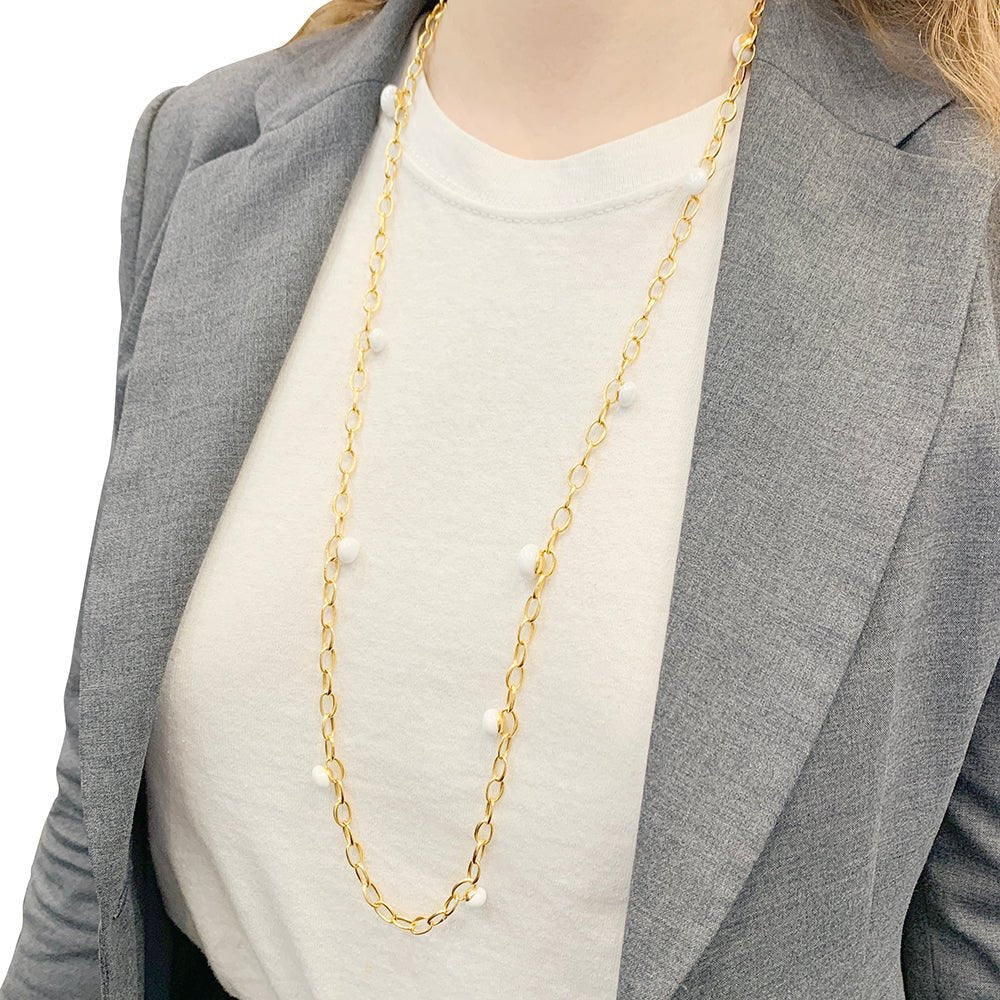 Sautoir Pomellato, "Capri", or rose, céramique blanche. - Castafiore