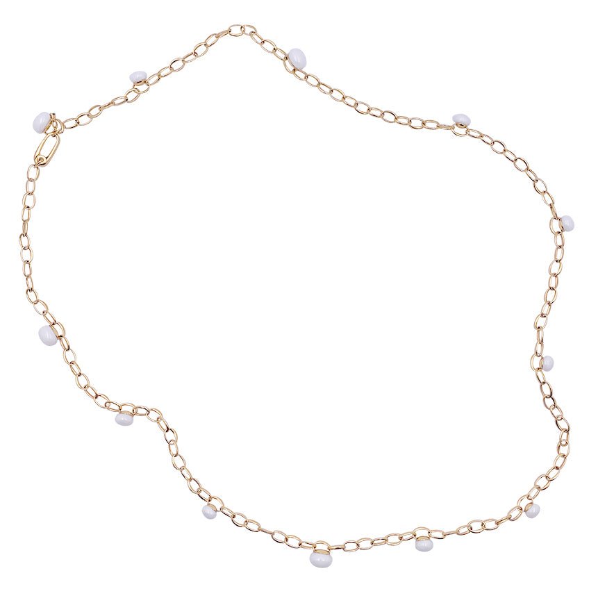 Sautoir Pomellato, "Capri", or rose, céramique blanche. - Castafiore
