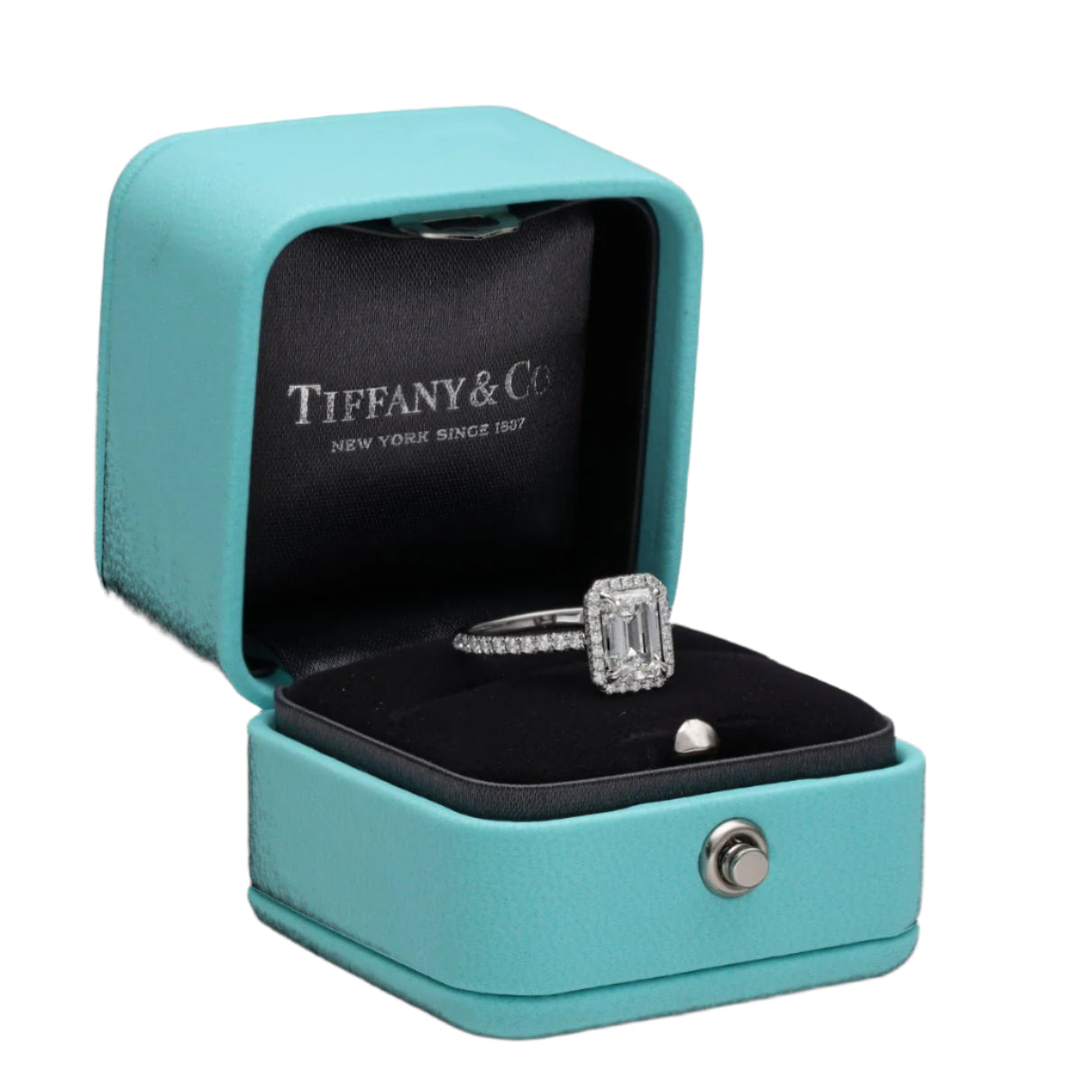 Solitaire Tiffany & Co "Soleste Halo" en platine avec un diamant taille émeraude de 1,59 Cts (H - VVS1). Taille 50. - Castafiore