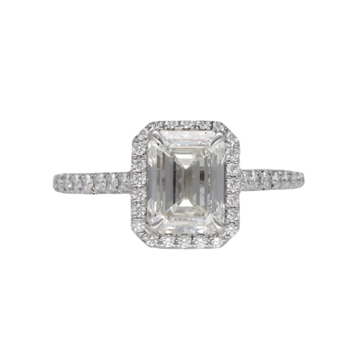 Solitaire Tiffany & Co "Soleste Halo" en platine avec un diamant taille émeraude de 1,59 Cts (H - VVS1). Taille 50. - Castafiore