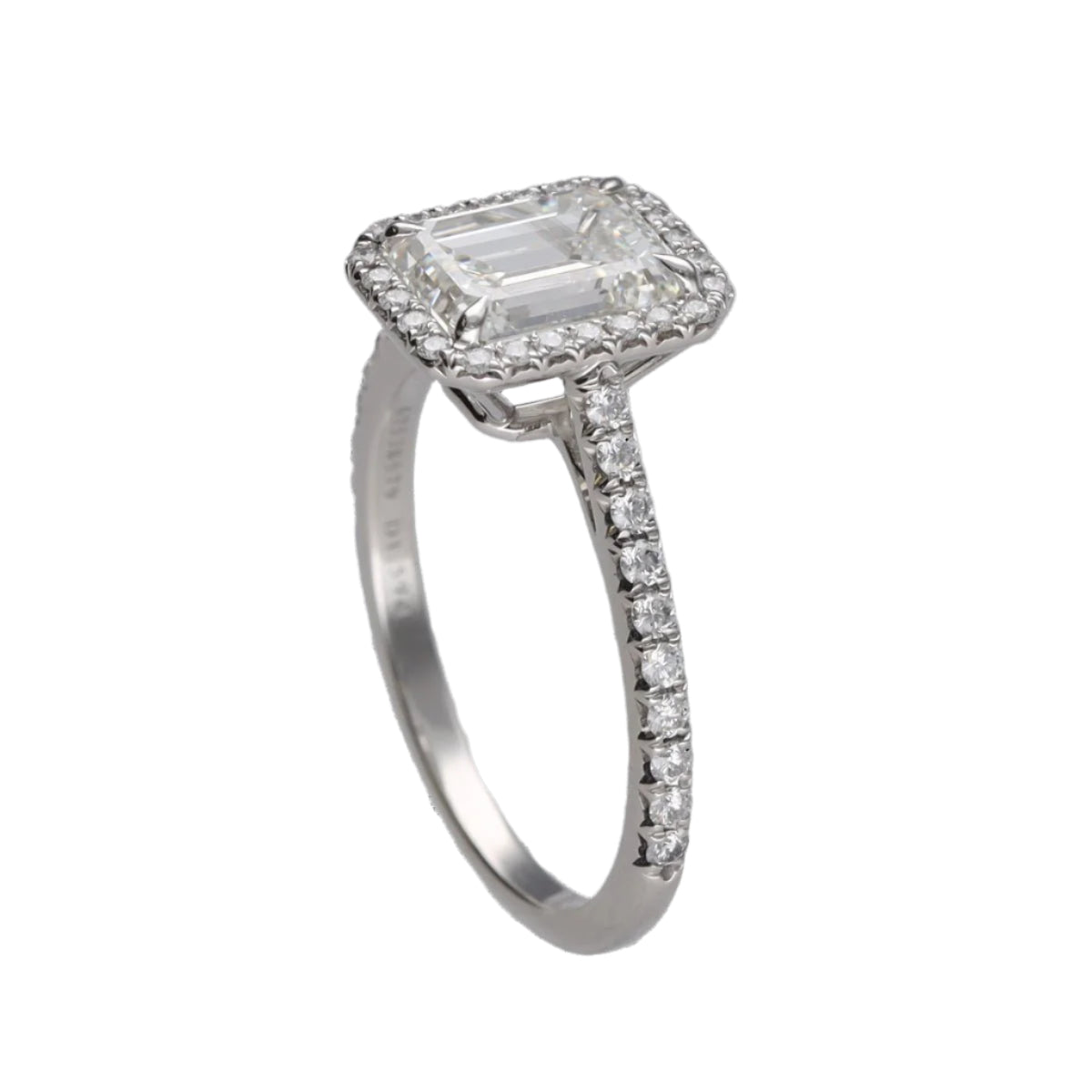 Solitaire Tiffany & Co "Soleste Halo" en platine avec un diamant taille émeraude de 1,59 Cts (H - VVS1). Taille 50. - Castafiore