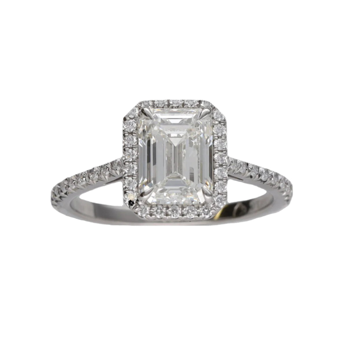 Solitaire Tiffany & Co "Soleste Halo" en platine avec un diamant taille émeraude de 1,59 Cts (H - VVS1). Taille 50. - Castafiore