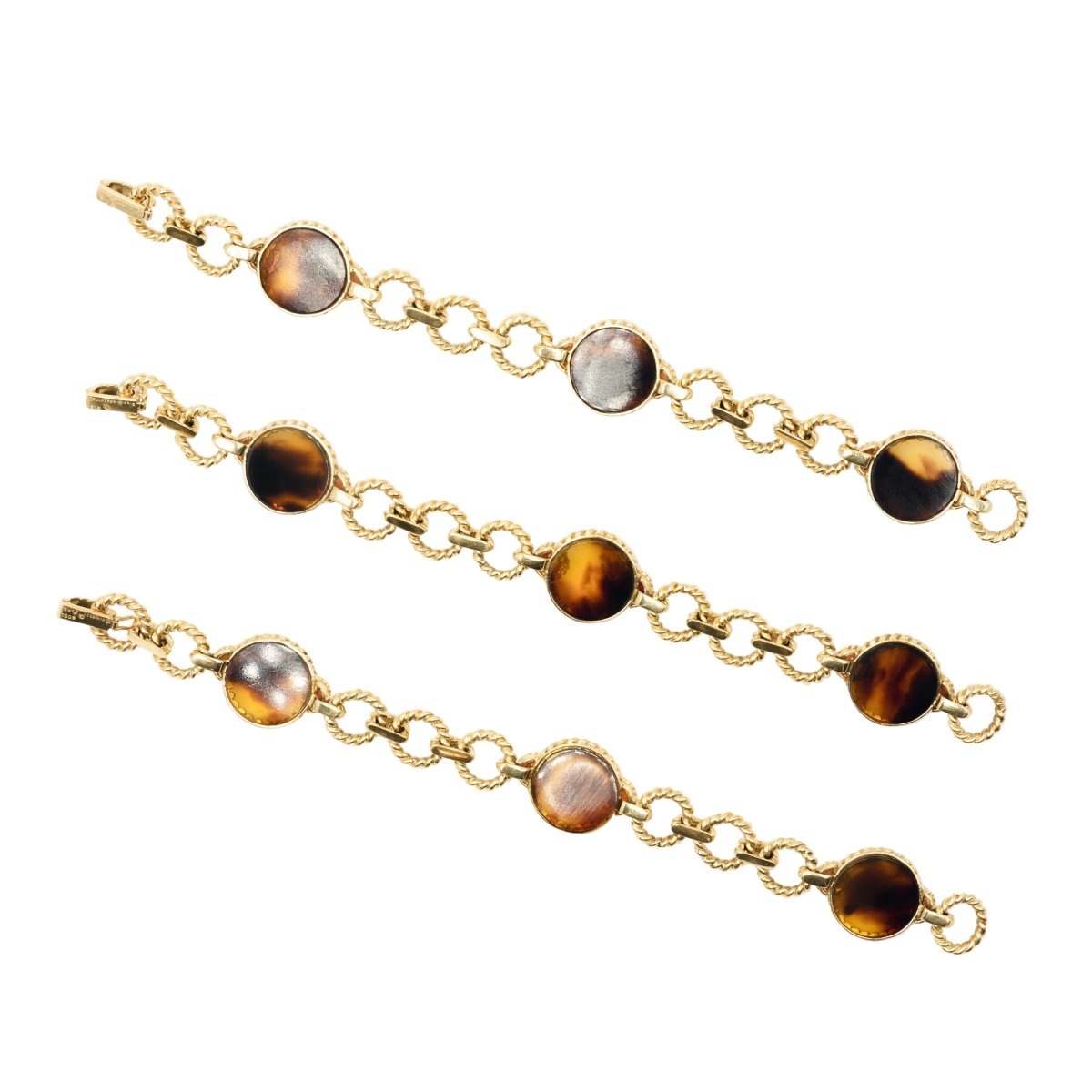 Trois bracelets BOUCHERON en or jaune et corail - Castafiore
