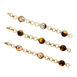 Trois bracelets BOUCHERON en or jaune et corail - Castafiore