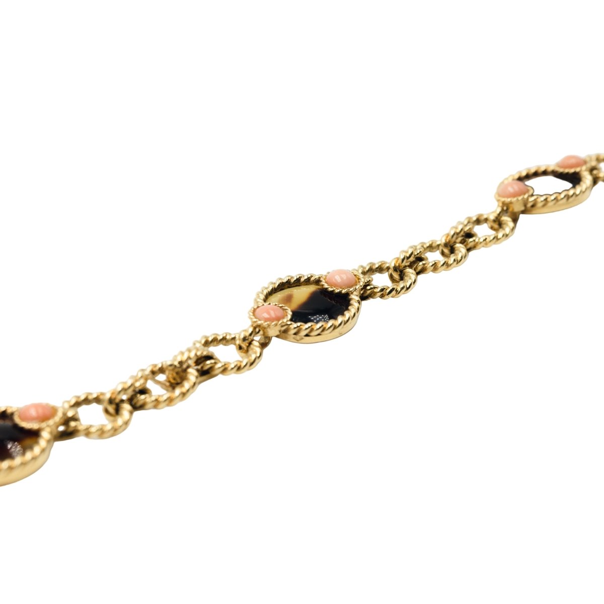 Trois bracelets BOUCHERON en or jaune et corail - Castafiore