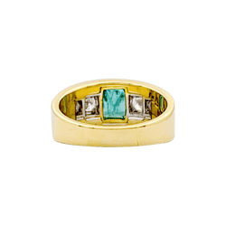 Bague bandeau deux tons d'or, émeraude et diamants.