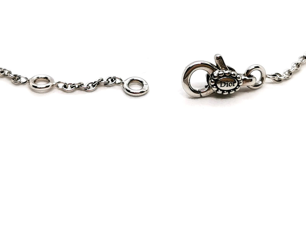 Bracelet DIOR "Rose des vents", or blanc, nacre et diamant