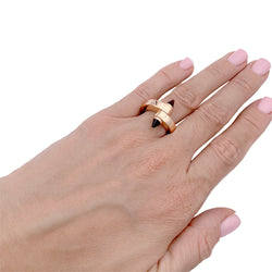 Bague CARTIER "Menottes" en or rose, grenats rhodolites