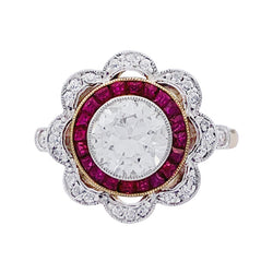 Bague ancienne "fleur" diamants et rubis calibés. - Castafiore