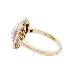 Bague ancienne "fleur" diamants et rubis calibés. - Castafiore