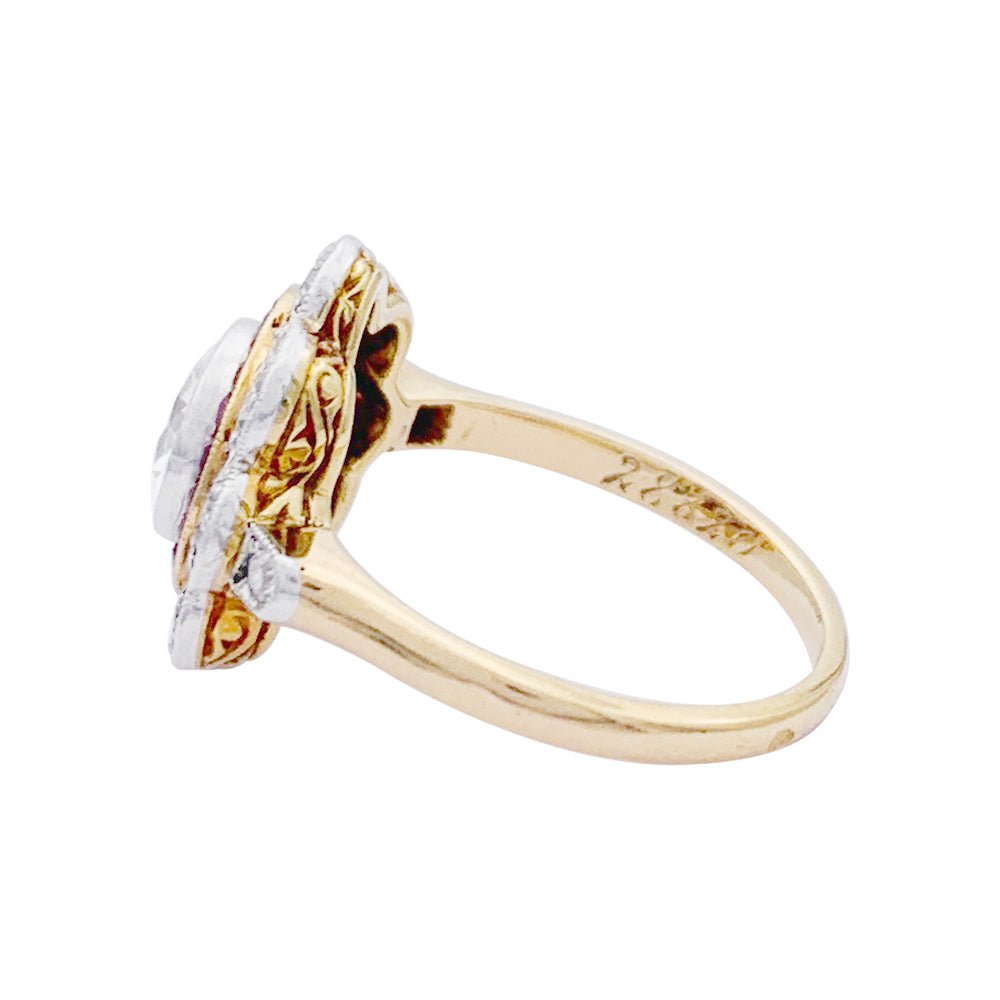 Bague ancienne "fleur" diamants et rubis calibés. - Castafiore