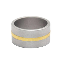 Bague Bandeau NIESSING en or jaune et acier - Castafiore