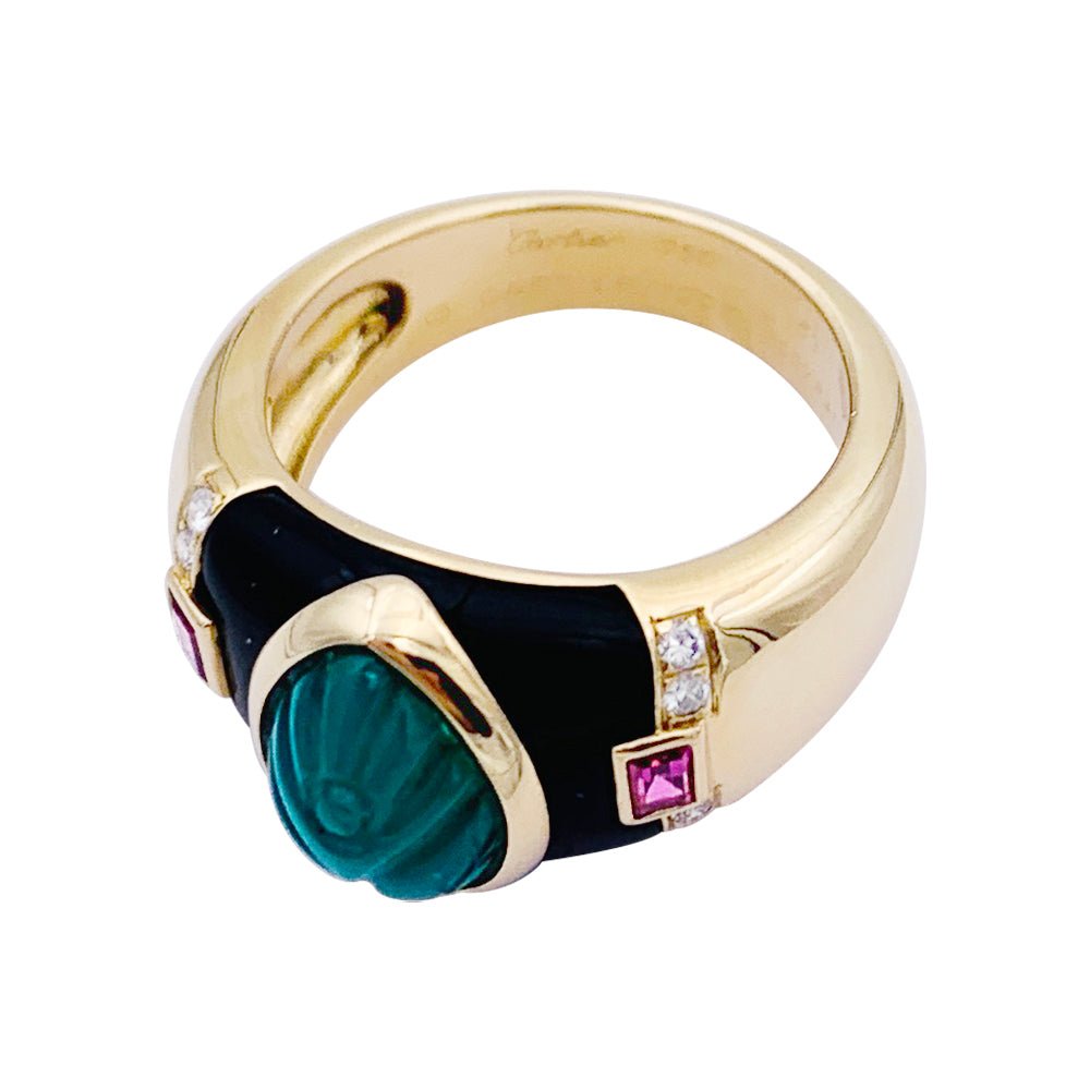 Bague CARTIER, "Gaïa", en or jaune et pierres de couleurs. - Castafiore