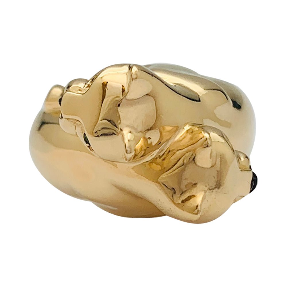 Bague Cartier, "Kozra", en or jaune, émeraude, onyx - Castafiore