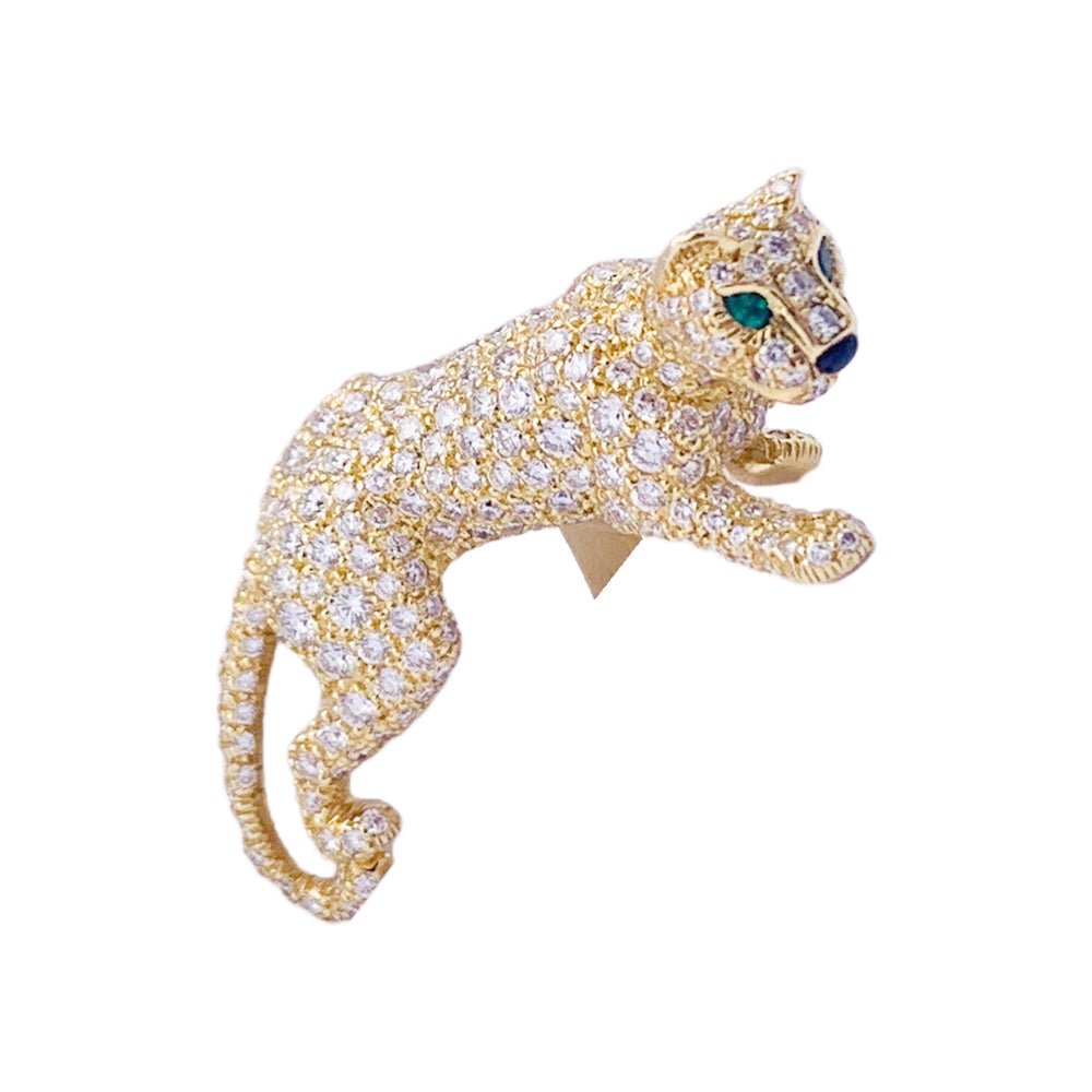 Bague CARTIER "Panthère de Cartier" en or jaune, émeraude, onyx et diamants - Castafiore