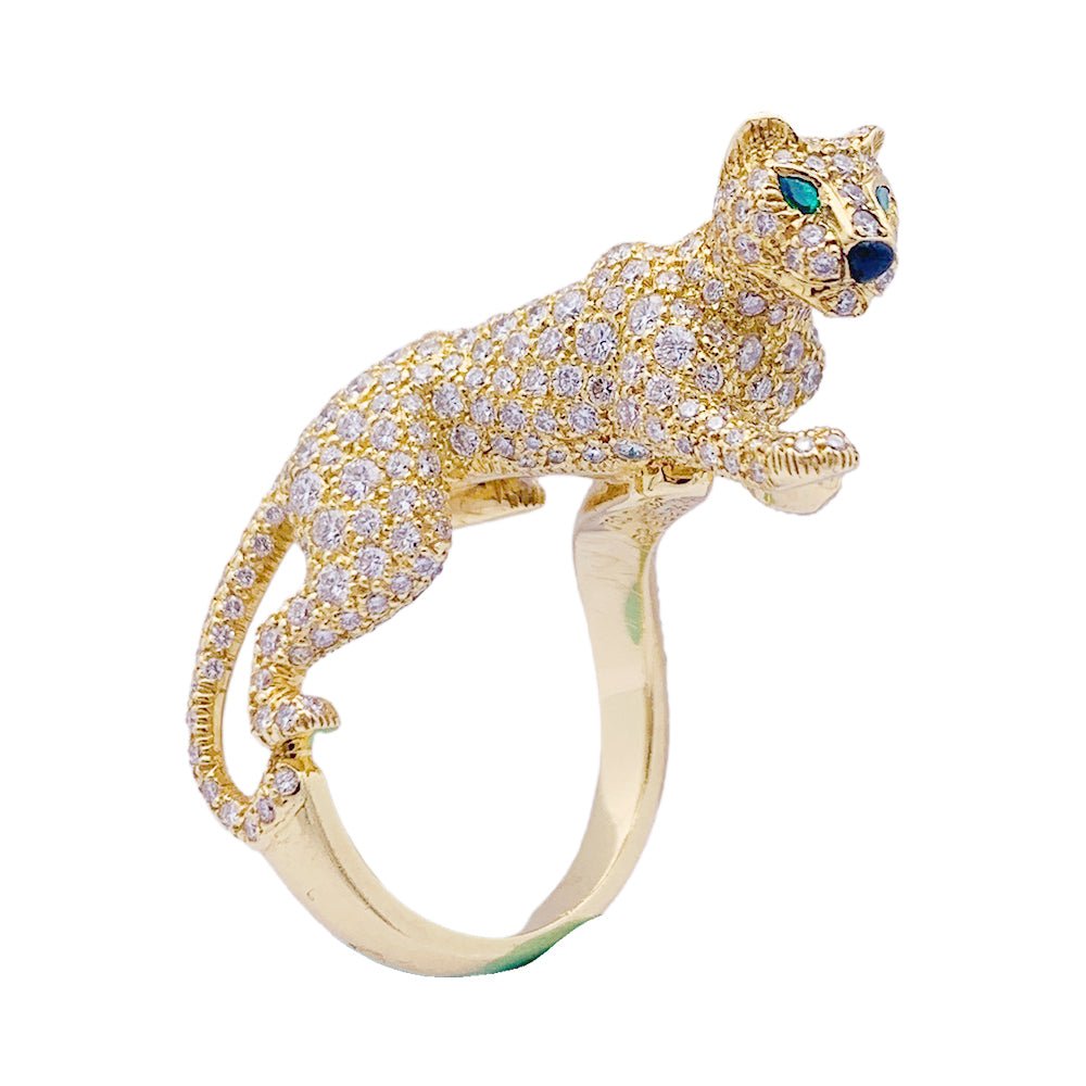 Bague CARTIER "Panthère de Cartier" en or jaune, émeraude, onyx et diamants - Castafiore