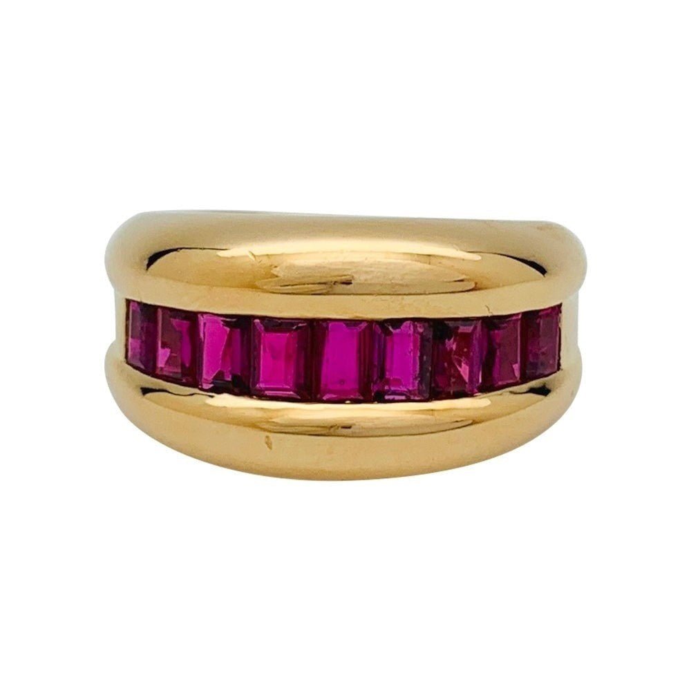 Bague Cartier,"Odin", or jaune, rubis calibrés - Castafiore
