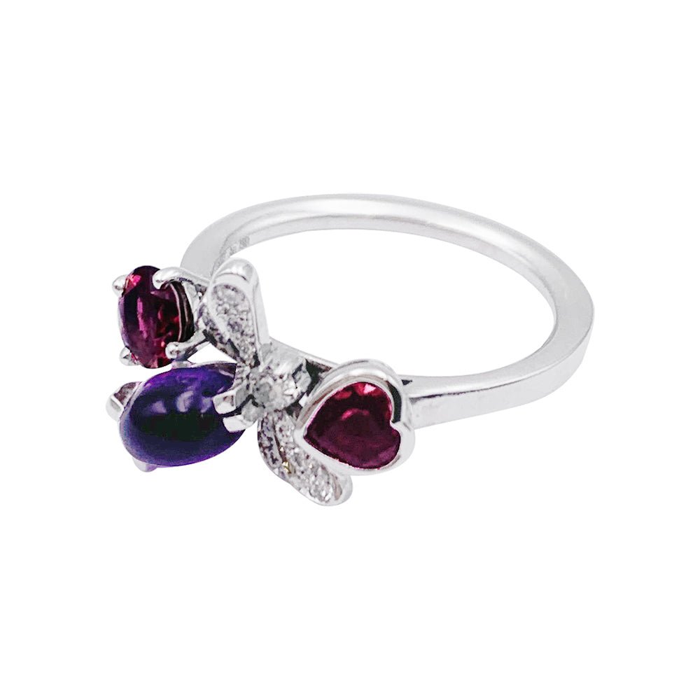 Bague Chaumet, "Attrape-moi...si tu m'aimes", or blanc, améthyste, grenat, diamants - Castafiore
