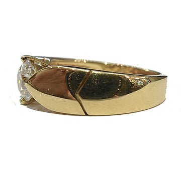 Bague CHAUMET "Plume" sertie d'un diamant de 0,77 carat E/VS2 - Castafiore