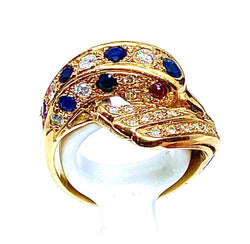 Bague dauphin en or jaune 18 carats ,saphirs ,diamants et rubis - Castafiore