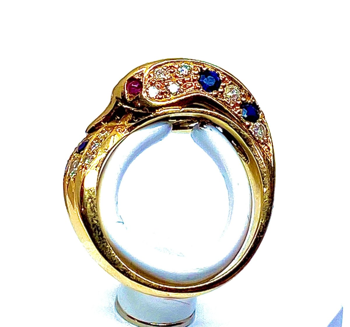 Bague dauphin en or jaune 18 carats ,saphirs ,diamants et rubis - Castafiore
