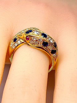 Bague dauphin en or jaune 18 carats ,saphirs ,diamants et rubis - Castafiore