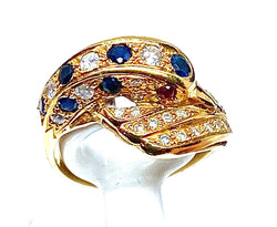Bague dauphin en or jaune 18 carats ,saphirs ,diamants et rubis - Castafiore