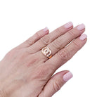 Bague DINH VAN "Menottes R13" en or rose et diamants - Castafiore