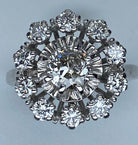 Bague en or 18 carats de forme marguerite «soleil» sertie de diamants - Castafiore