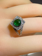 Bague en or 18 carats sertie d’une superbe émeraude cabochon et diamants - Castafiore