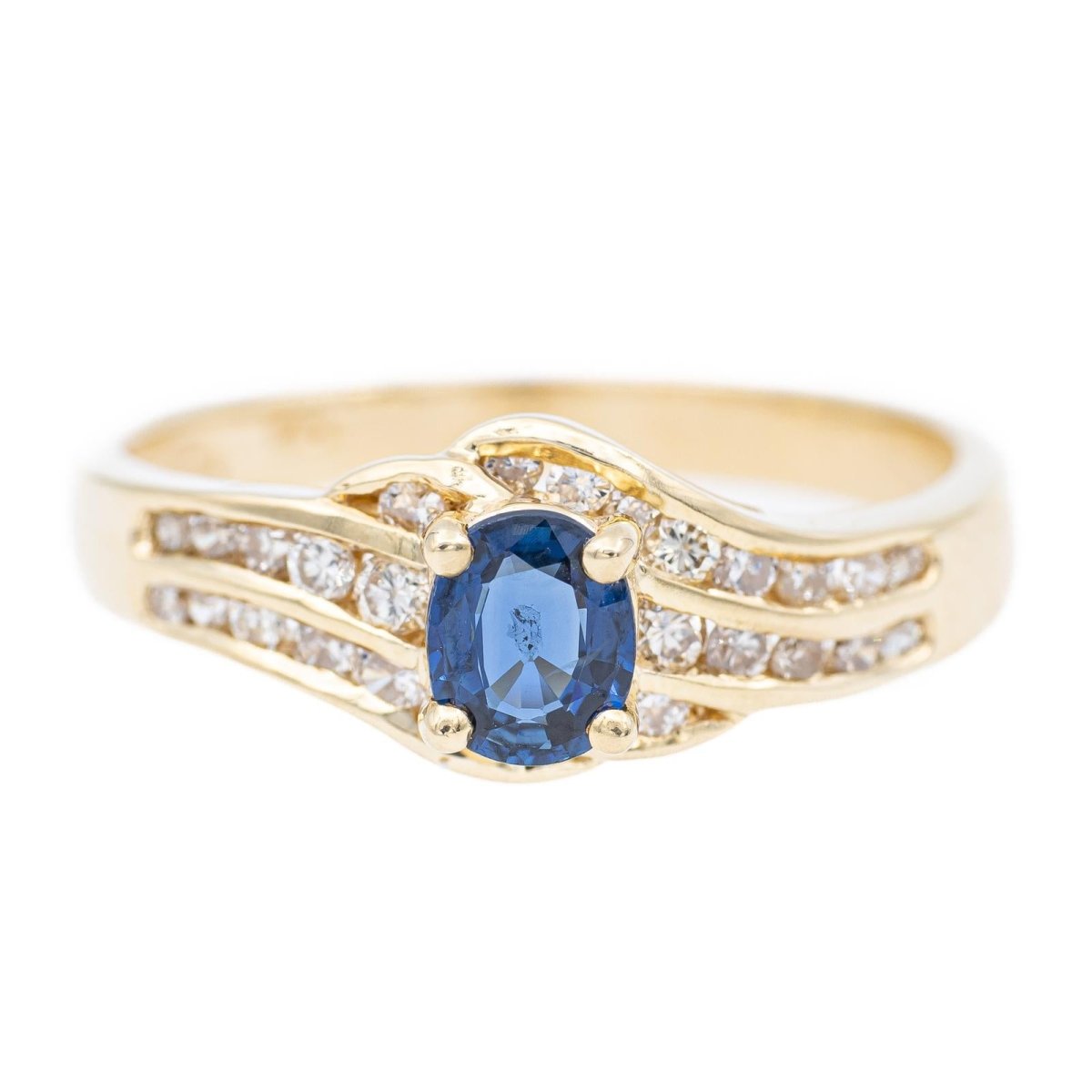 Bague en or jaune, diamants et saphir - Castafiore