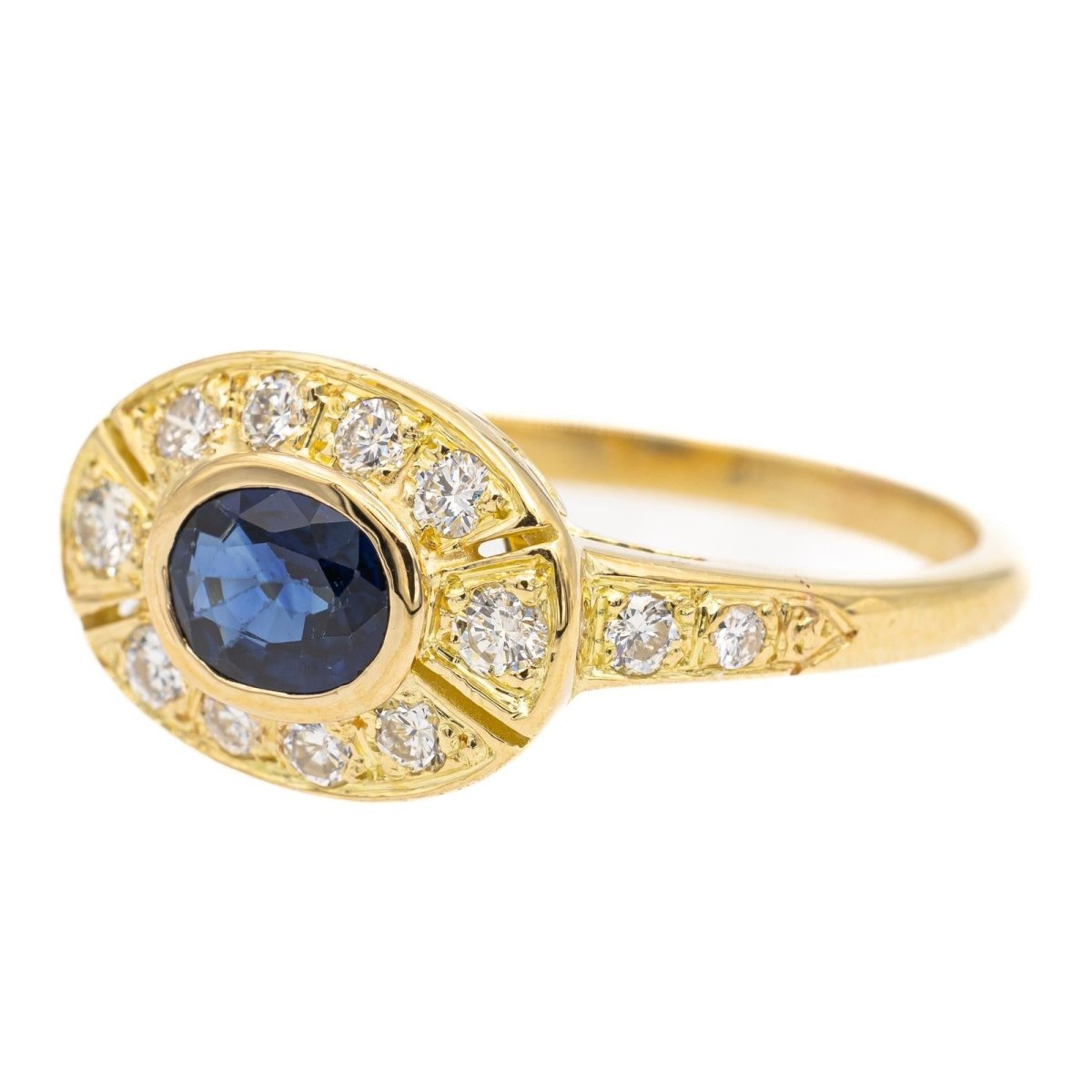Bague en or jaune, diamants et saphir - Castafiore