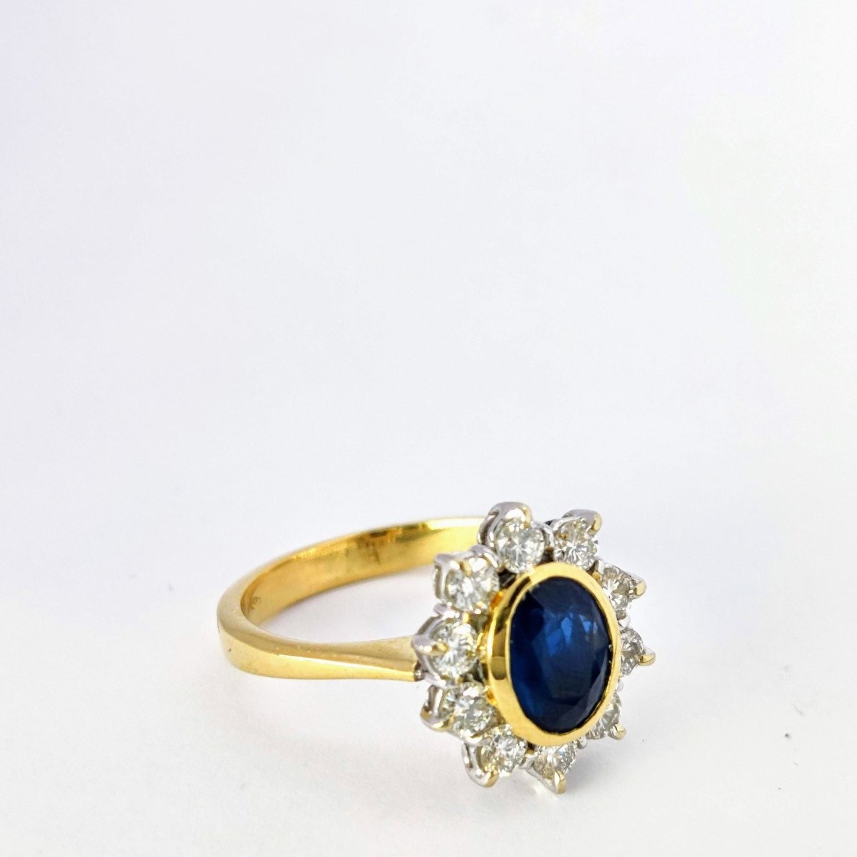 BAGUE EN OR JAUNE DIAMANTS ET SAPHIR - Castafiore
