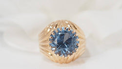 Bague en or jaune et topaze bleue - Castafiore