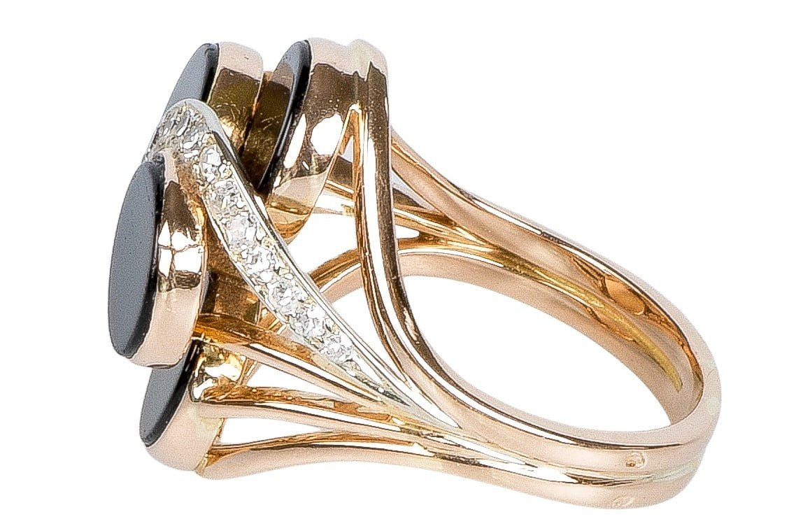 Bague en or rose à décor d' onyx et diamants - Castafiore