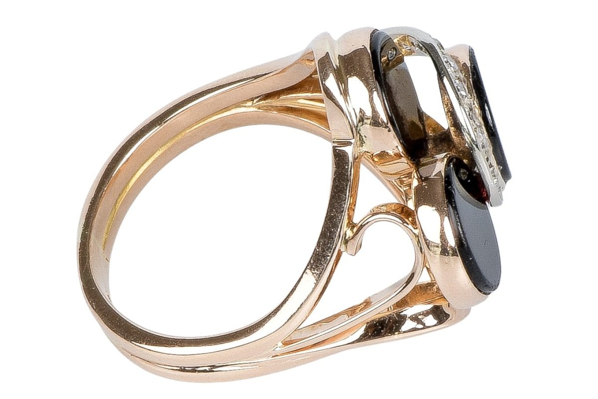 Bague en or rose à décor d' onyx et diamants - Castafiore