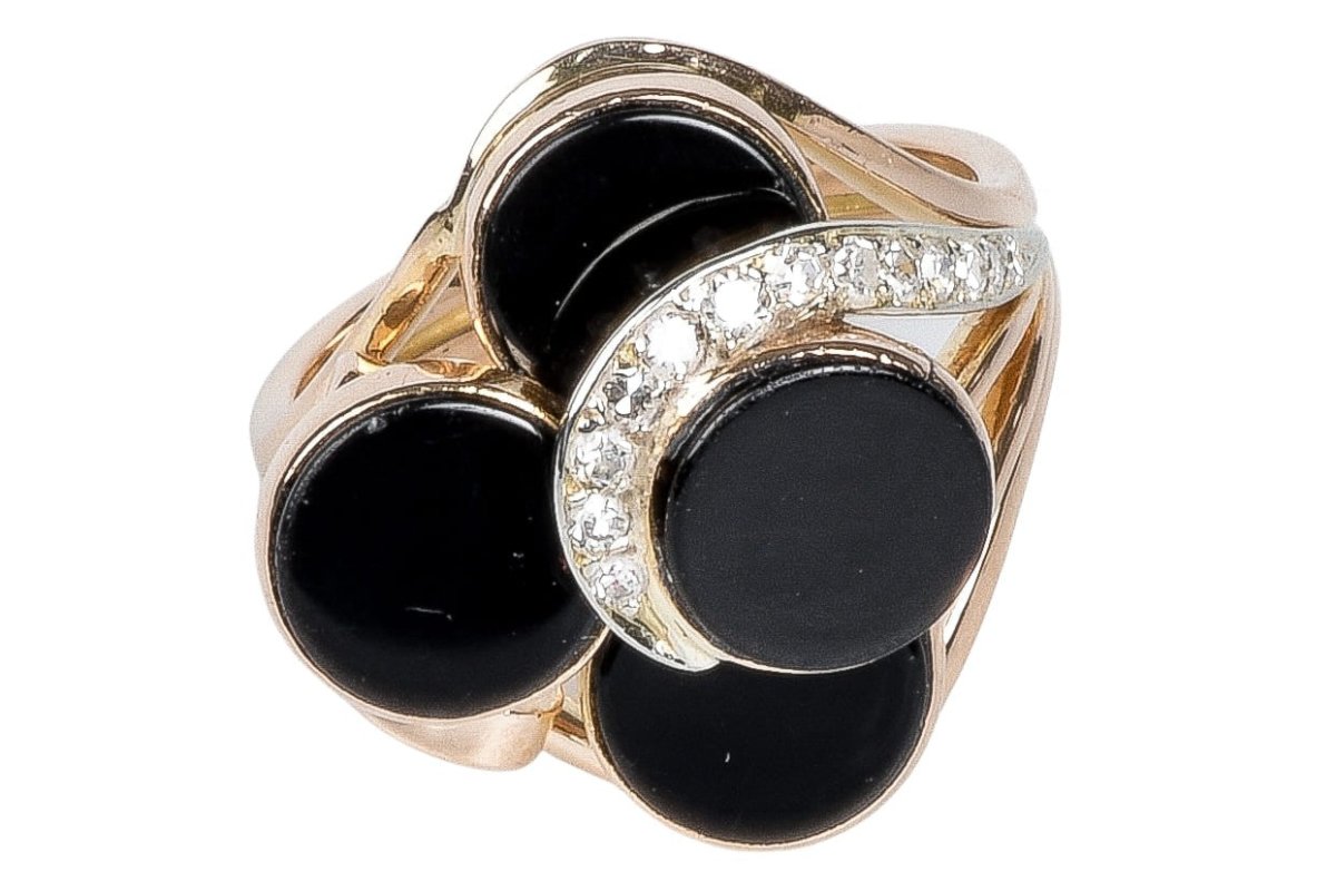 Bague en or rose à décor d' onyx et diamants - Castafiore