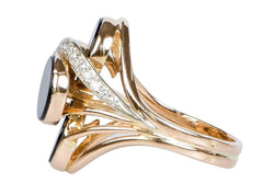 Bague en or rose à décor d' onyx et diamants - Castafiore
