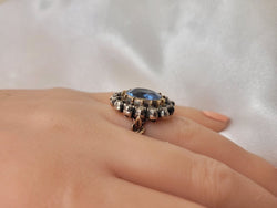 Bague Entourage en or jaune, argent, topaze et diamants - Castafiore