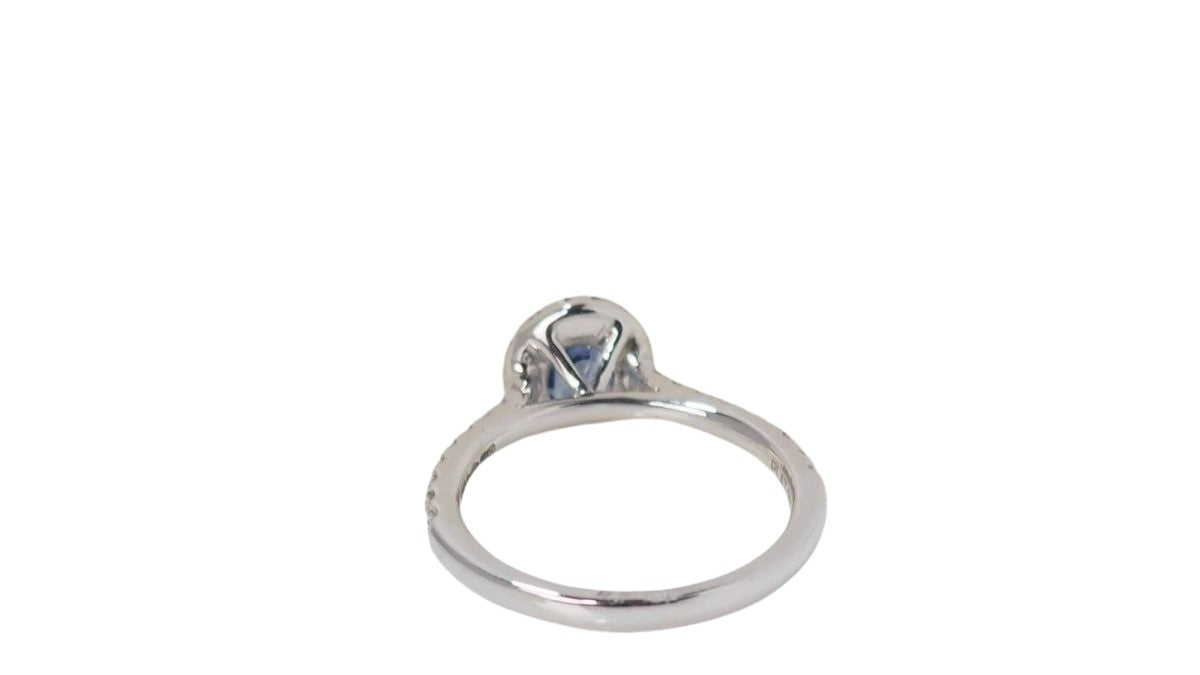 Bague entourage en platine, saphir Ceylan et diamants - Castafiore