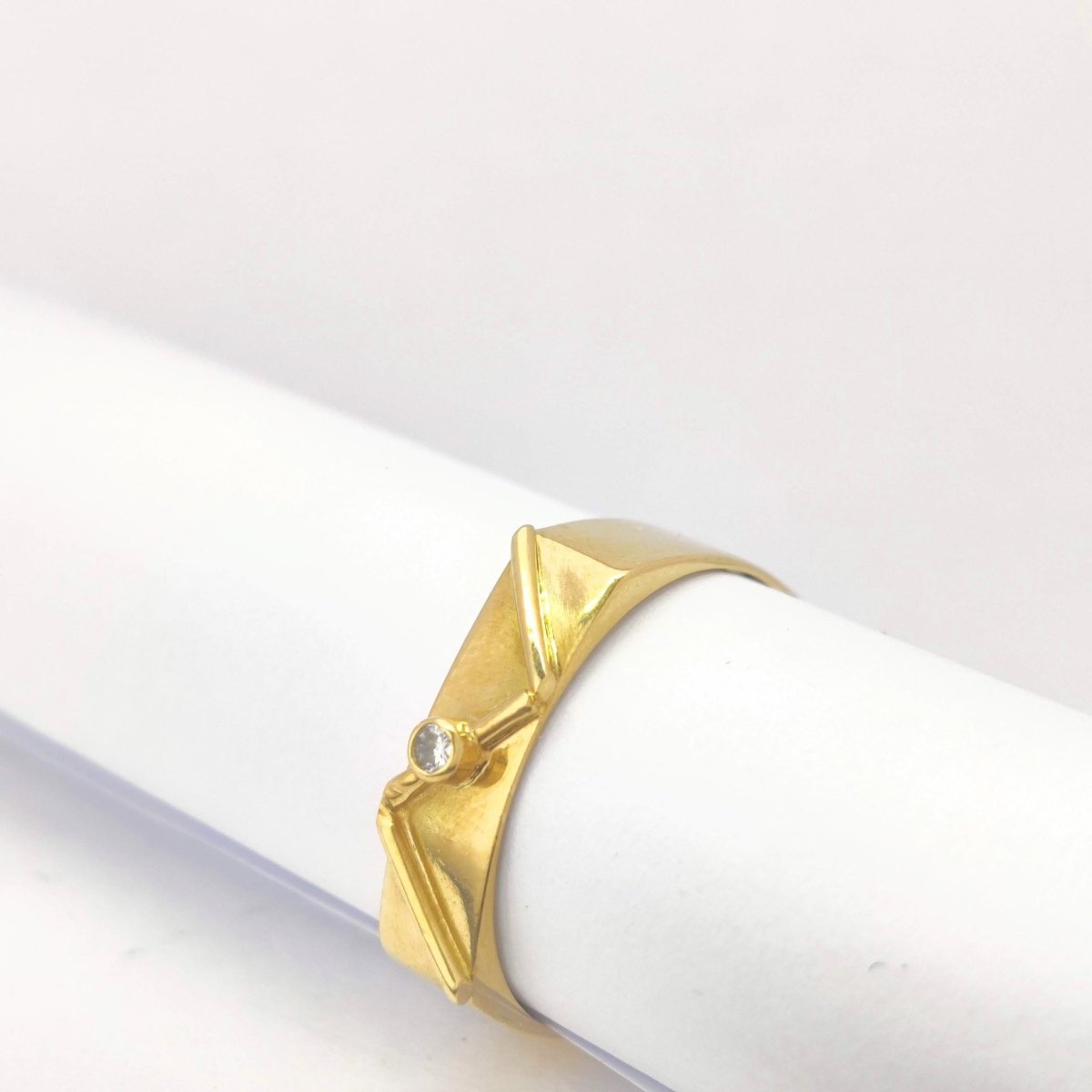 Bague géométrique en or jaune et diamant - Castafiore